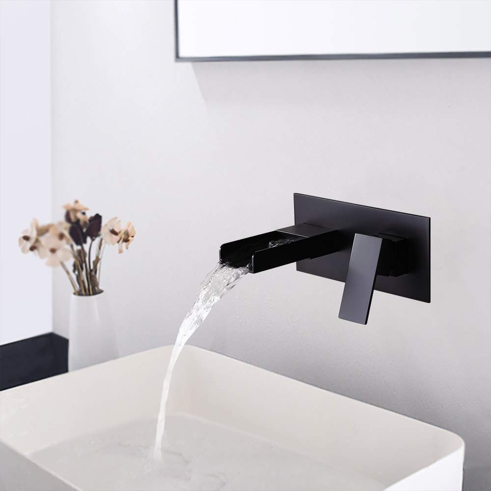 Wall-mounted matte black basin tap